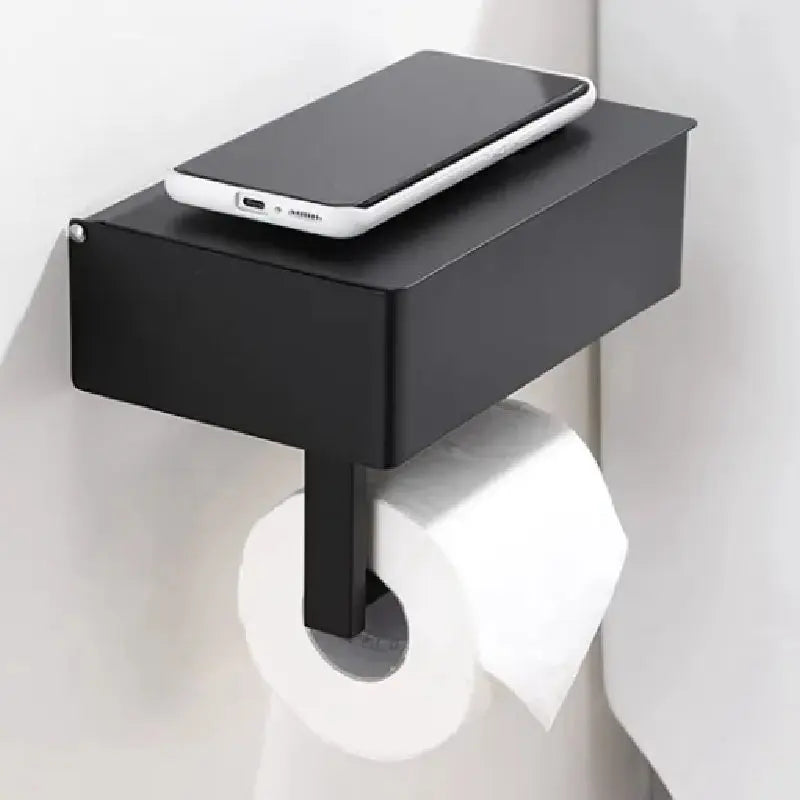 Black Elegance Guard: A sophisticated matte black toilet roll holder featuring a smart storage compartment. Luxinsly